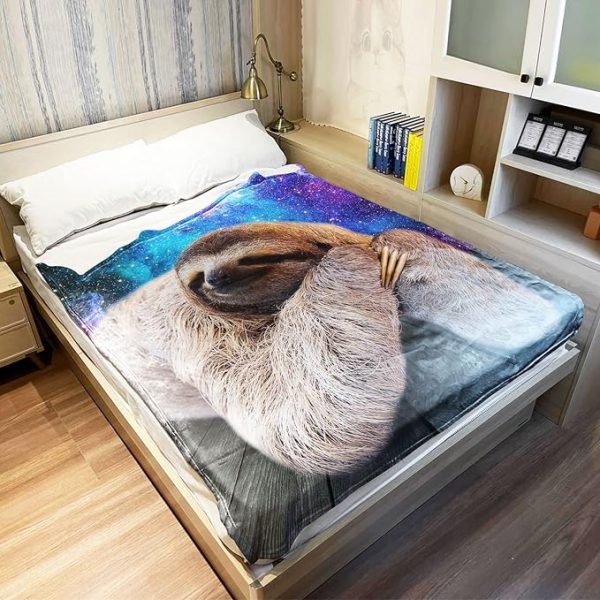 Sloth throw blanket on bed
